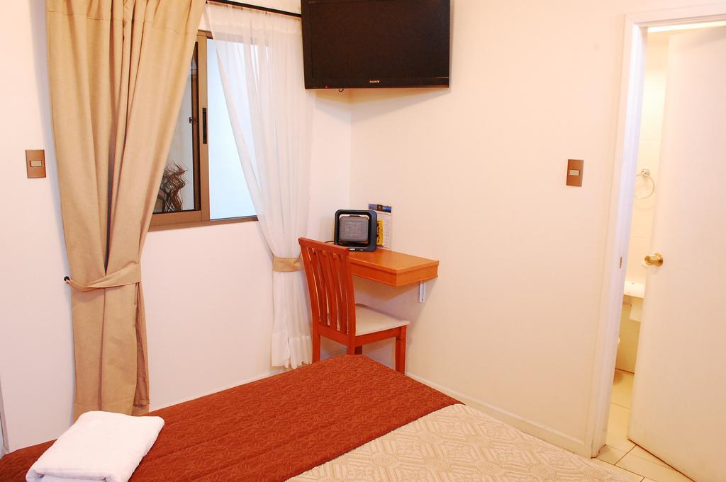 Hotel Artelar Antofagasta Quarto foto