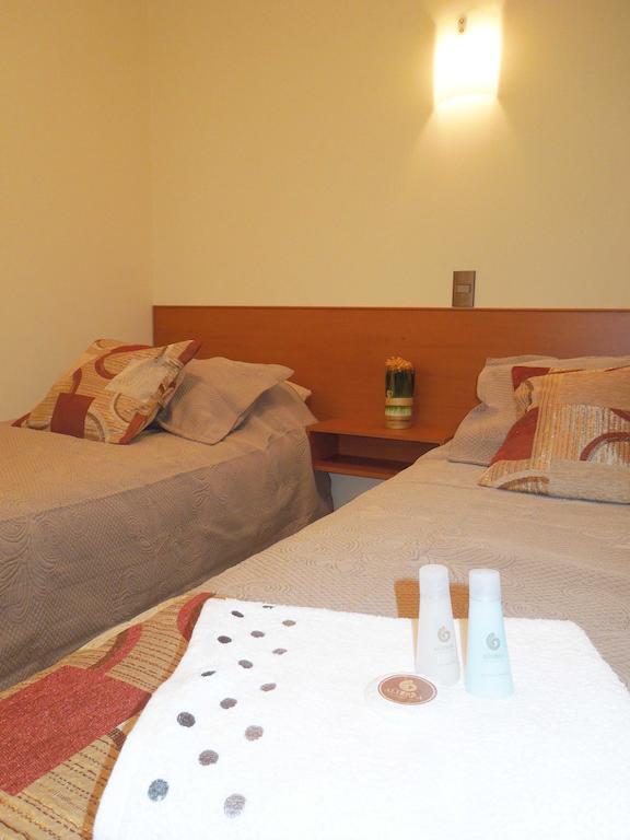 Hotel Artelar Antofagasta Quarto foto